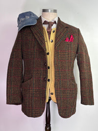 Harris Tweed blazer on mannequin with mustard cardigan
