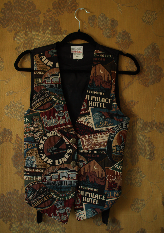 Vintage 1990s GAP patchwork silk tie vest, front view on hanger